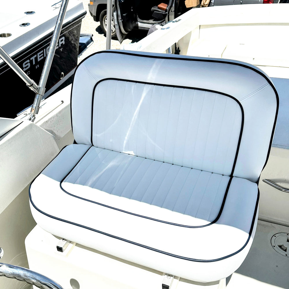 custom marine vinyl seat cushions with piping on small motor yacht by Gray Canvasworks 