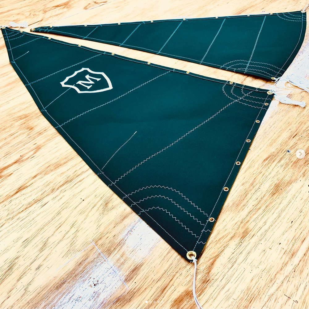 custom canvas monogrammed model sails with brass hardware in Midcoast Maine