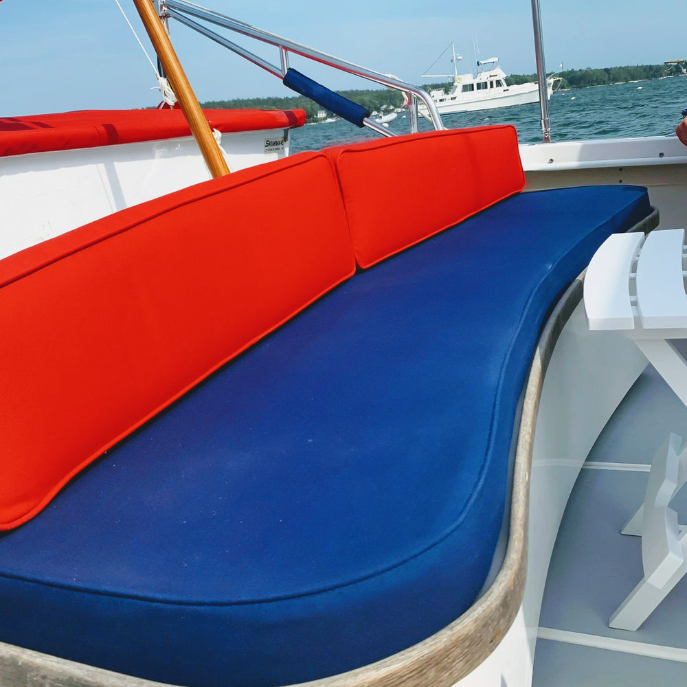 Custom marine canavs stern cushions by Gray Canvasworks in sunbrella fabric on small motor yacht