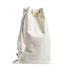 Ditty bag of tough, off-white canvas. Elegant vintage cylindrical design, white cotton rope woven through brass grommets to cinch shut.